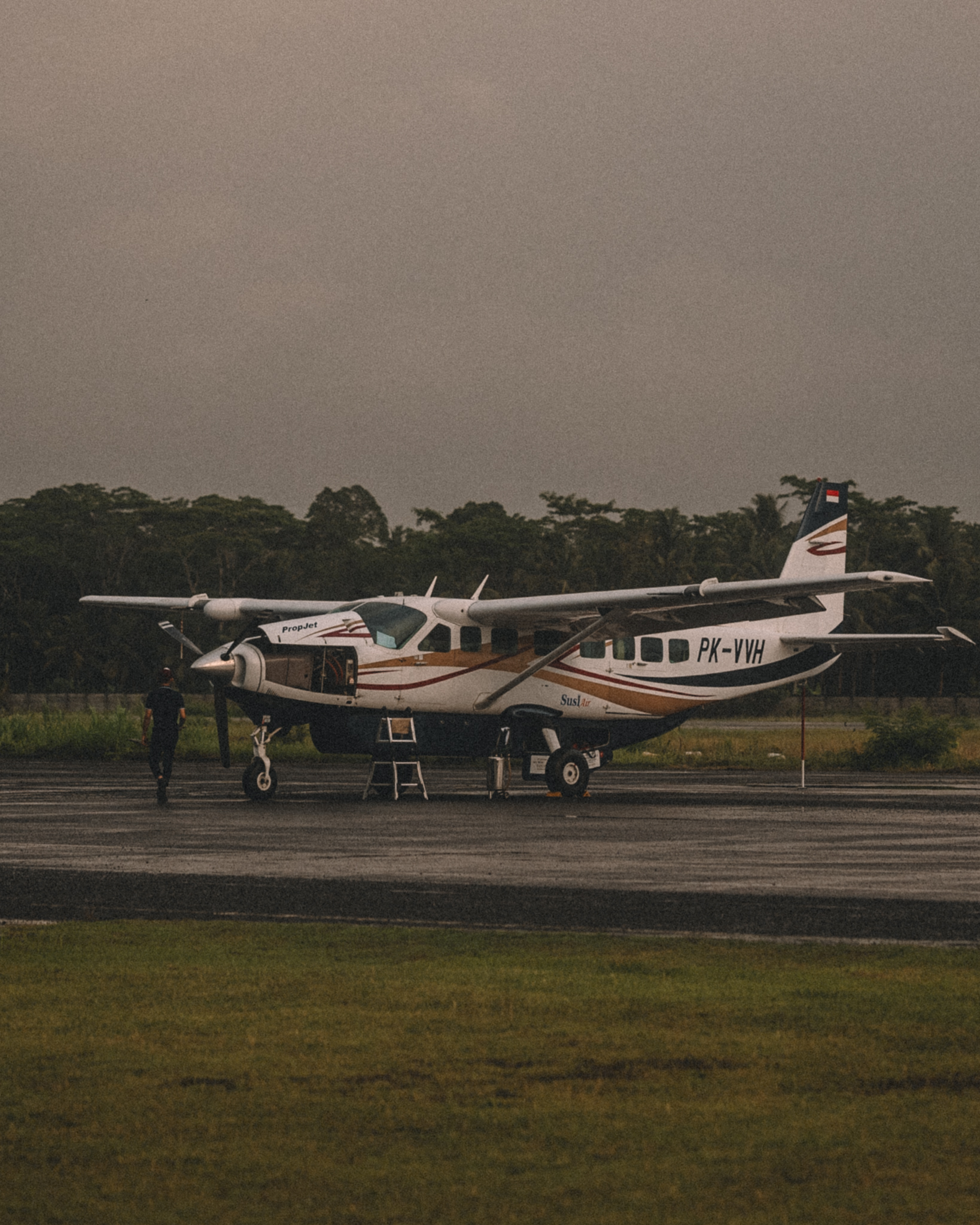 A small aircraft standing on a quiet airstrip