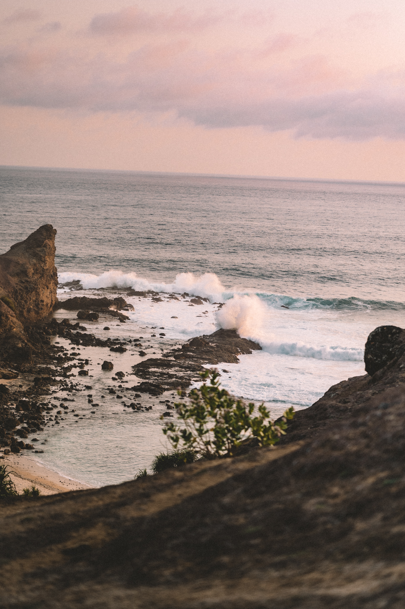 Waves breaking below the headland